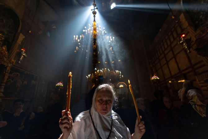 A Christian pilgrim holds candles as people gather during the ceremony of the Holy Fire at the Church of the Holy Sepulchre, in Jerusalem's Old City, on Saturday, May 4. <a href="index.php?page=&url=https%3A%2F%2Fwww.cnn.com%2F2024%2F05%2F02%2Fworld%2Fgallery%2Fphotos-this-week-april-25-may-2%2Findex.html" target="_blank">See last week in 34 photos</a>.