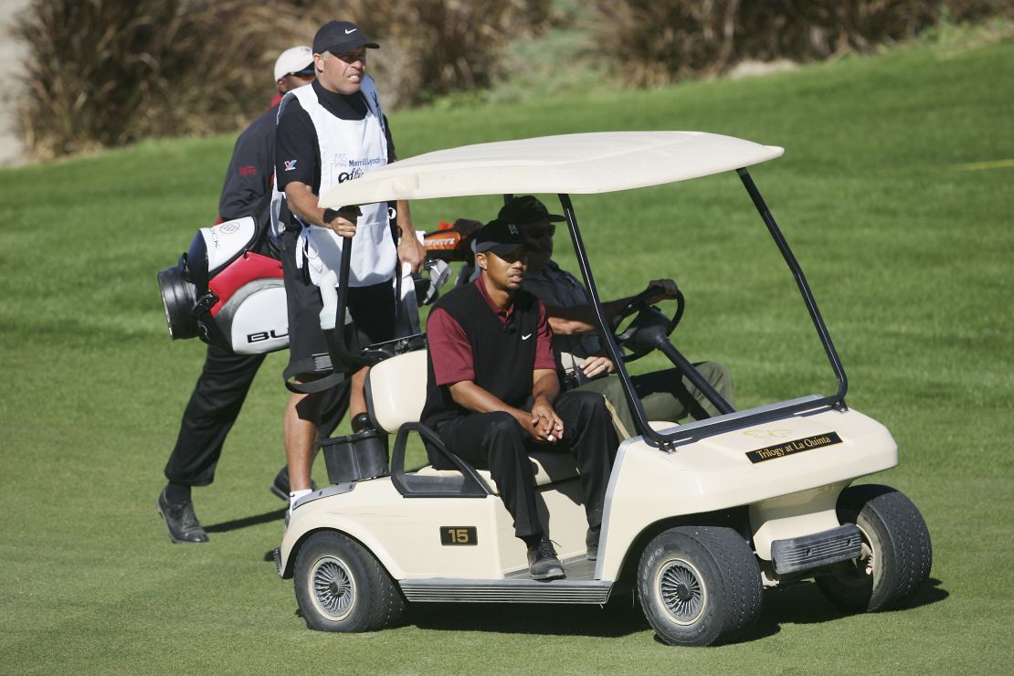 LA QUINTA, CA - NOVEMBER 27:  Tiger Woods and caddie Steve Williams ride up the fourteenth fairway in a golf cart during the final day of the Skins Game at the Trilogy Golf Club on November 27, 2005 in La Quinta, California.  (Photo by Jeff Gross/Getty Images)