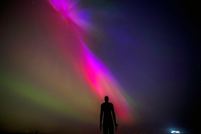 The aurora borealis is seen at Crosby Beach in Liverpool, England, on May 10.