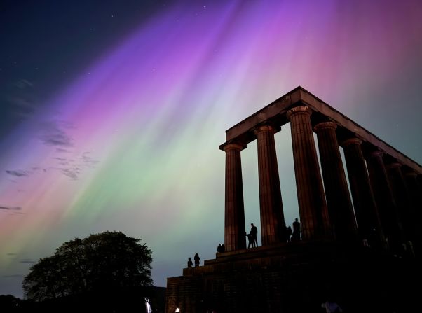 The aurora borealis glows over Edinburgh, Scotland, on May 10.