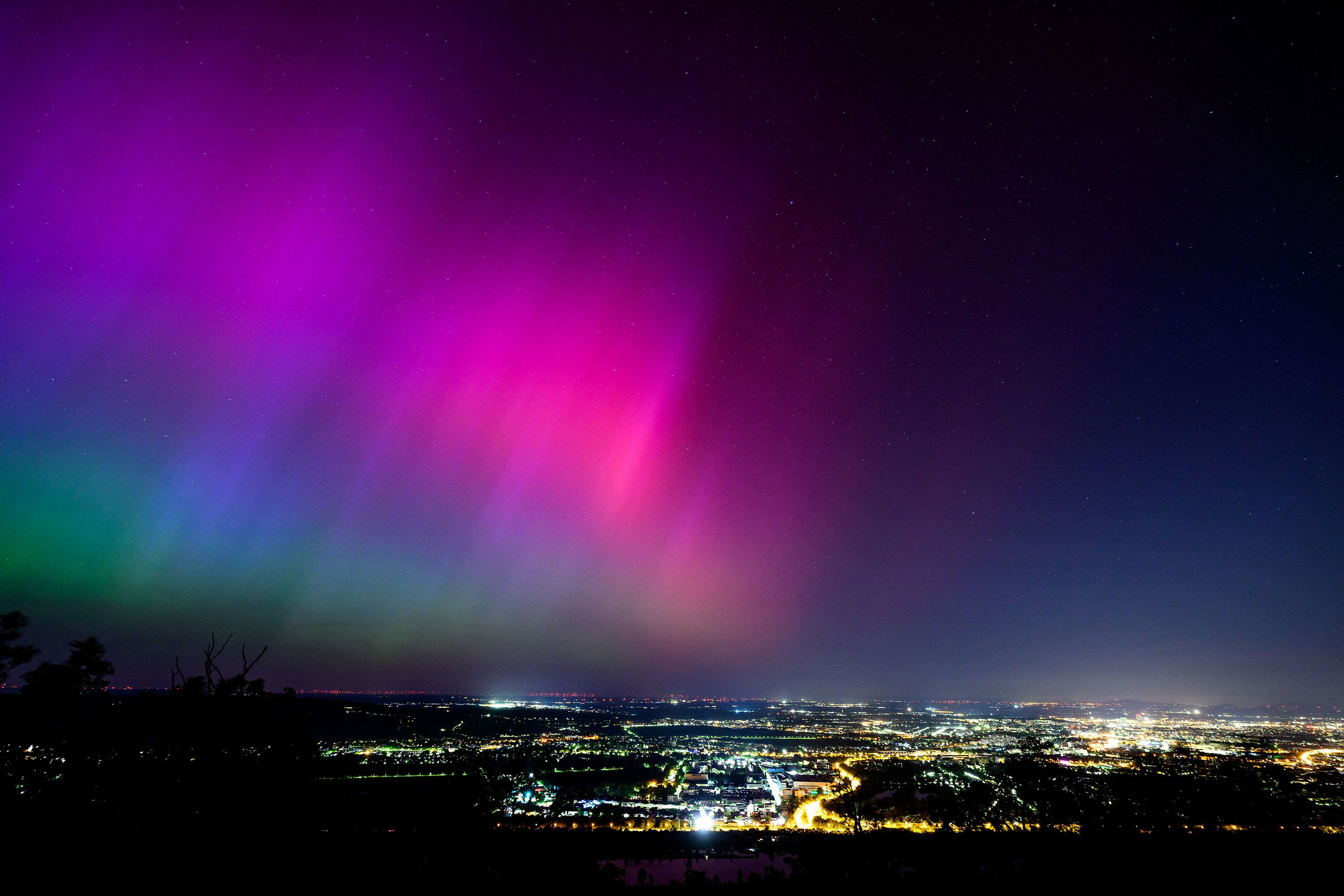 The aurora borealis glows over Vienna on May 11.