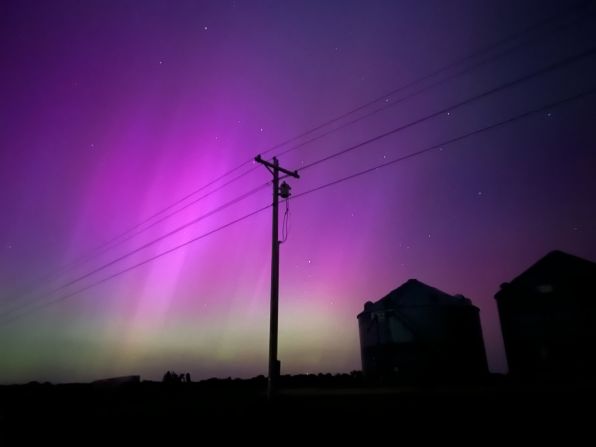 The northern lights are seen in the sky over Rich Hill, Missouri, on May 10.