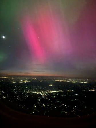 The aurora borealis lights are seen over western Tennessee out the window of a flight from Washington, DC, to Memphis, Tennessee, on May 10.