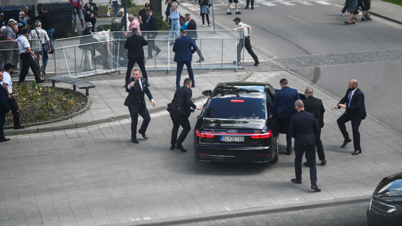 Security officers move Slovak PM Robert Fico in a car after a shooting incident, after a Slovak government meeting in Handlova, Slovakia, May 15, 2024. REUTERS/Radovan Stoklasa