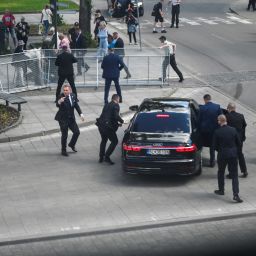Security officers move Slovak PM Robert Fico in a car after a shooting incident, after a Slovak government meeting in Handlova, Slovakia, May 15, 2024. REUTERS/Radovan Stoklasa