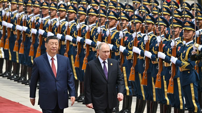 Russia's President Vladimir Putin and China's President Xi Jinping attend an official welcoming ceremony in front of the Great Hall of the People in Tiananmen Square in Beijing on May 16, 2024.