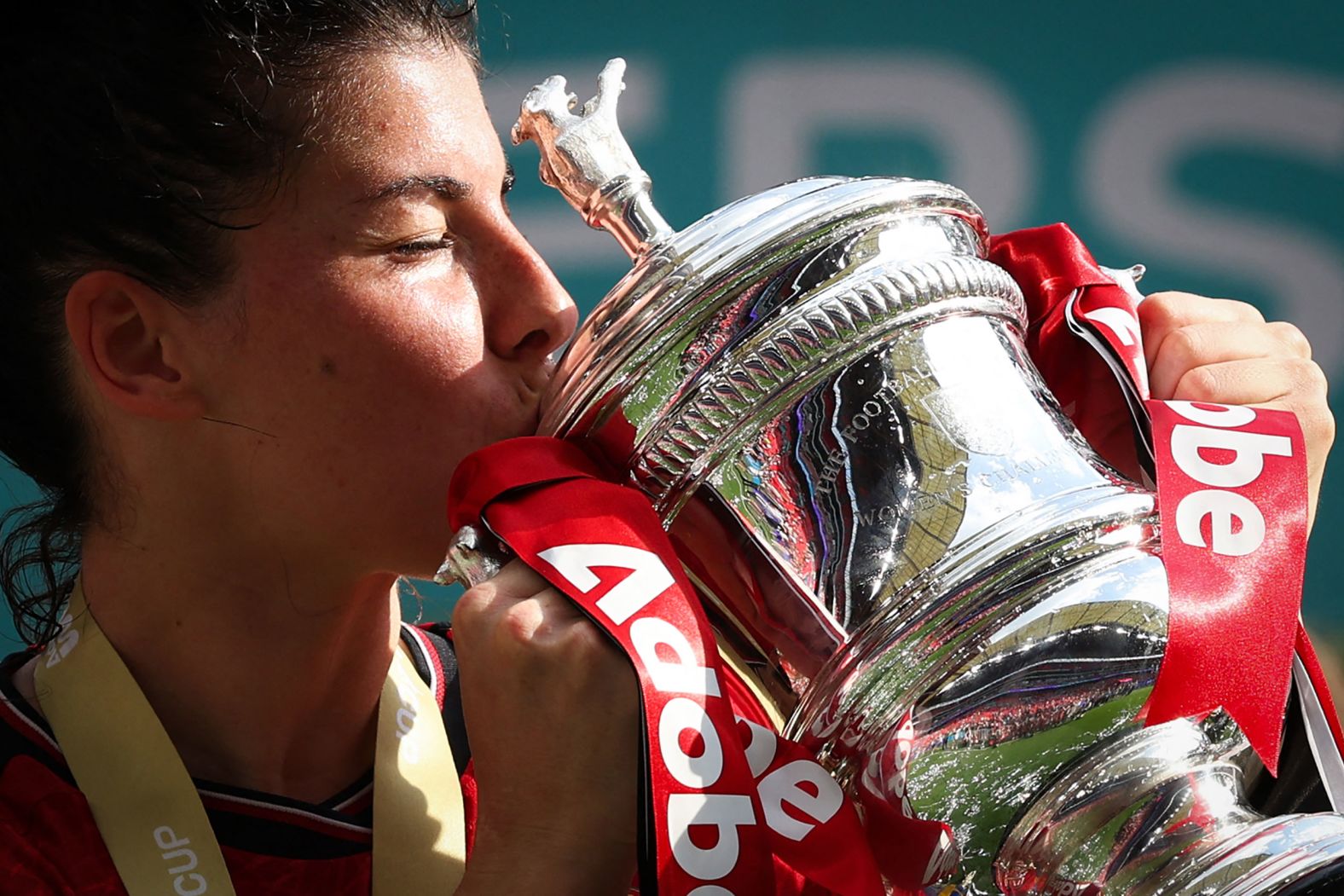 Manchester United forward Lucía García kisses the trophy after her club <a href="index.php?page=&url=https%3A%2F%2Fwww.cnn.com%2F2024%2F05%2F12%2Fsport%2Fmanchester-united-fa-cup-tottenham-hotspur-spt-intl%2Findex.html" target="_blank">won the Women's FA Cup for the first time in its history</a> on Sunday, May 12. United defeated Tottenham Hotspur 4-0 at London's Wembley Stadium.