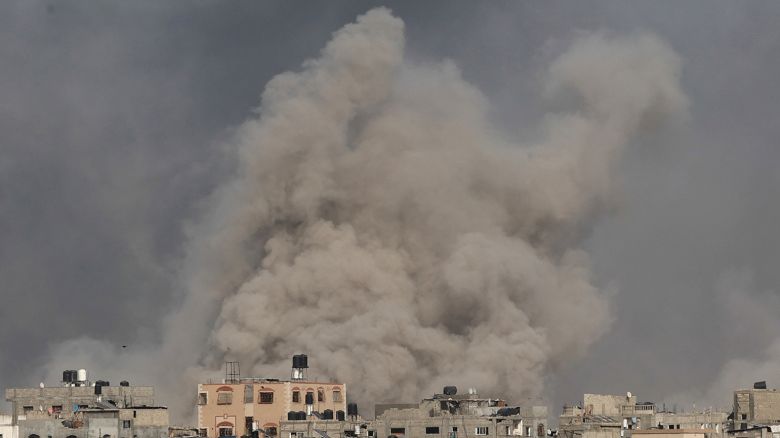 Smoke billows after an Israeli strike on Jabalia as seen from Beit Lahia, in the northern Gaza Strip on May 19, 2024, amid the ongoing conflict between Israel and the militant Hamas group. 
