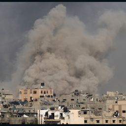 Smoke billows after an Israeli strike on Jabalia as seen from Beit Lahia, in the northern Gaza Strip on May 19, 2024, amid the ongoing conflict between Israel and the militant Hamas group.