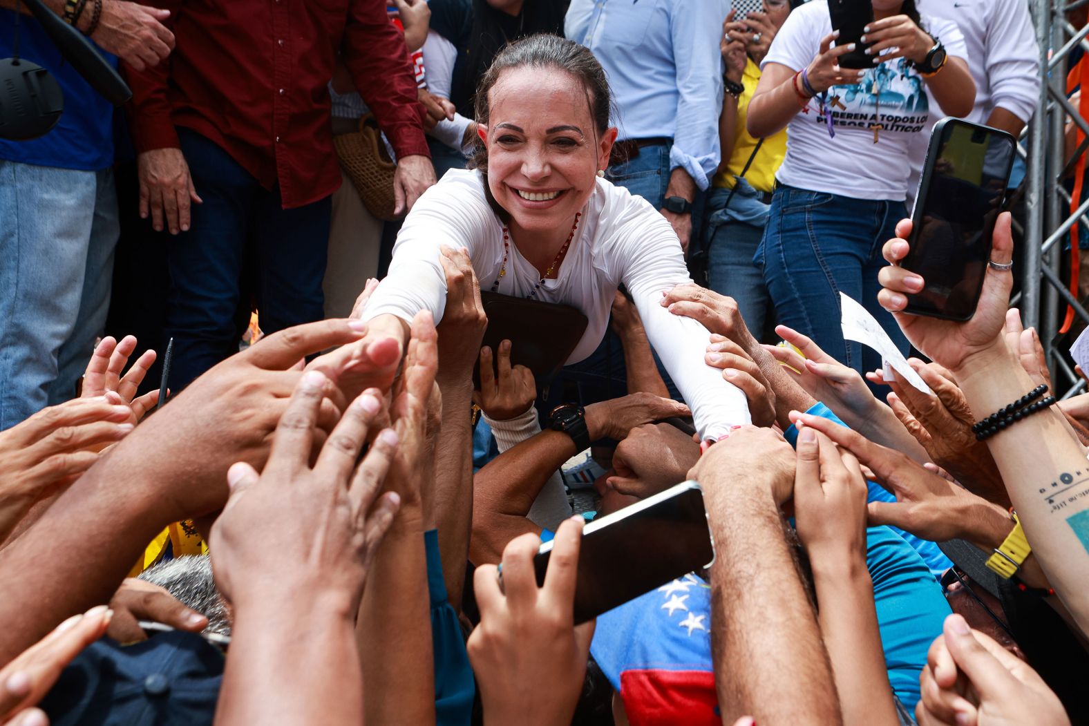 Opposition leader Maria Corina Machado greets supporters during a rally in Aragua, Venezuela, on Saturday, May 18. It was the first rally convened by Gonzalez Urrutia, who will face President Nicolas Maduro in July's presidential election. In January, <a href="index.php?page=&url=https%3A%2F%2Fwww.cnn.com%2F2024%2F01%2F30%2Fworld%2Fvenezuela-sanctions-maria-corina-machado-intl-latam%2Findex.html" target="_blank">Venezuela's Supreme Court barred Machado from running for president</a>.