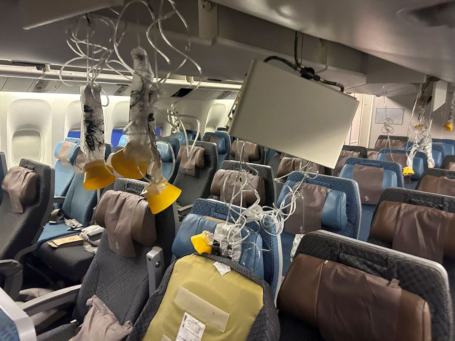 The interior of <a href="index.php?page=&url=https%3A%2F%2Fwww.cnn.com%2F2024%2F05%2F21%2Fworld%2Fsingapore-airlines-turbulence-bangkok%2Findex.html" target="_blank">Singapore Airline flight SG321</a> is pictured after an emergency landing at Bangkok's Suvarnabhumi International Airport, Thailand, on Tuesday, May 21. One passenger died and 71 people were injured when their Singapore Airlines flight from London to Singapore encountered severe turbulence. <a href="index.php?page=&url=https%3A%2F%2Fwww.cnn.com%2F2024%2F05%2F23%2Fasia%2Fsingapore-airlines-flight-spinal-injuries-intl%2Findex.html" target="_blank">More than 20 people aboard remain in intensive care</a>.