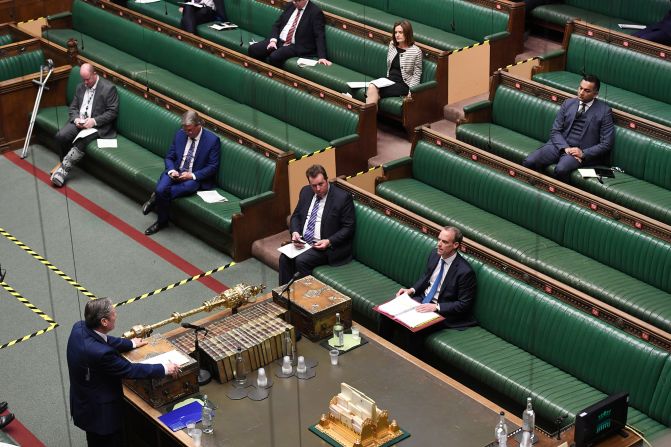 Starmer, front left, attends a hybrid Parliament session in London in April 2020.