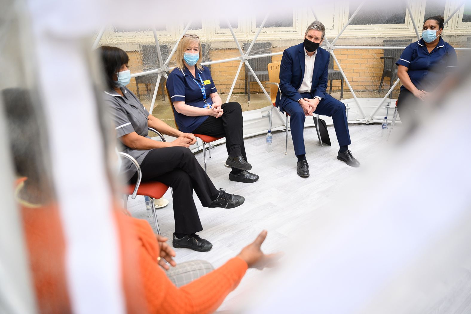Starmer speaks with nurses and midwives during a visit to the Whittington Hospital in London in March 2021.