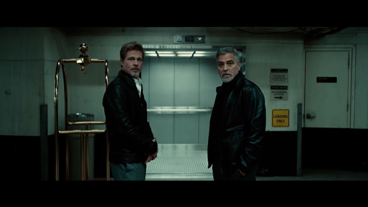 Brad Pitt and George Clooney in "Wolfs."