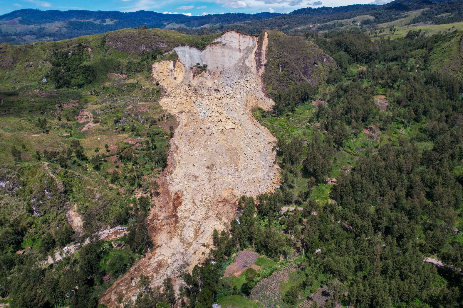 This photo, taken on Monday, May 27, shows the damage caused by a <a href="index.php?page=&url=https%3A%2F%2Fwww.cnn.com%2F2024%2F05%2F28%2Fasia%2Fpapua-new-guinea-landslide-satellite-imagery-intl%2Findex.html" target="_blank">devastating landslide</a> that left as many as 2,000 people buried under rubble in Papua New Guinea. The landslide hit the remote village of Kaokalam, about 600 kilometers (372 miles) northwest of the capital Port Moresby. 