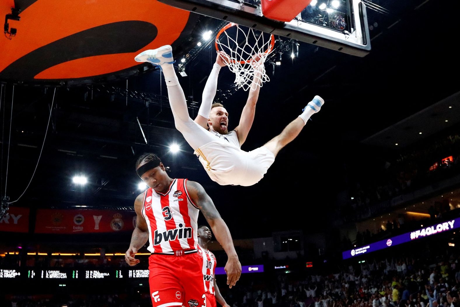Real Madrid's Dzanan Musa reacts after a dunk against Olympiacos during the EuroLeague Final Four on Friday, May 24. Real Madrid won 87-76 to advance to the final, which it lost to Panathinaikos on Sunday.