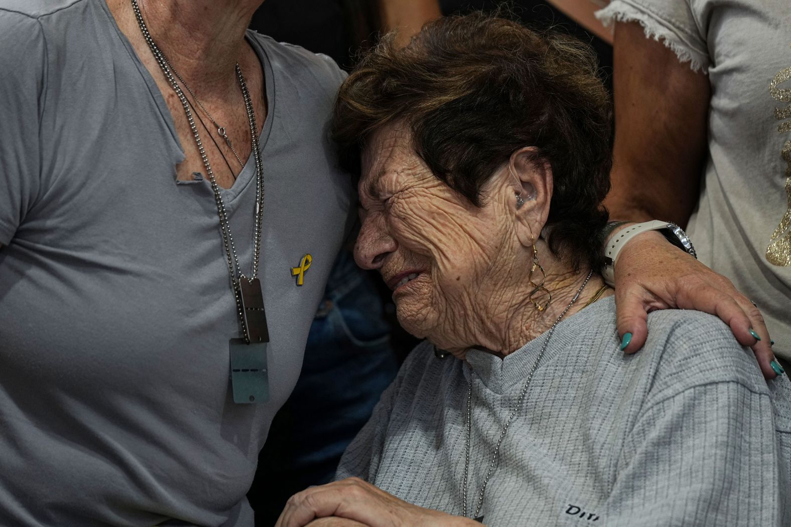 People grieve at Michel Nisenbaum's funeral, which was held in Ashkelon, Israel, on Sunday, May 26. Nisenbaum, 59, was a Brazilian-Israeli citizen <a href="index.php?page=&url=https%3A%2F%2Fwww.cnn.com%2Fmiddleeast%2Flive-news%2Fisrael-hamas-war-gaza-news-05-24-24%2Fh_12dfb9f64a05d5734e838d3a4d2a8468" target="_blank">who was killed in the Hamas-led October 7 attacks in southern Israel</a>. Israeli forces say <a href="index.php?page=&url=https%3A%2F%2Fwww.cnn.com%2Fmiddleeast%2Flive-news%2Fisrael-hamas-war-gaza-news-05-24-24%2Fh_836dd8c476cbf2856cbeaa21c97b6076" target="_blank">they found his body and the bodies of two other hostages</a> after "intense combat" in Jabalya, Gaza.