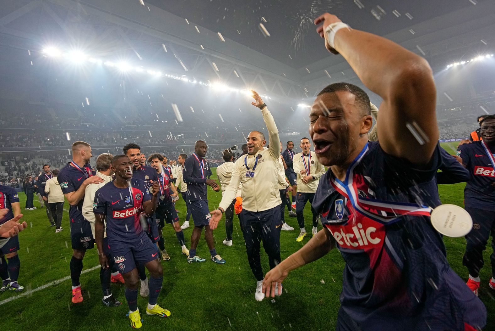 Paris Saint-Germain's Kylian Mbappé, right, celebrates after his club won the French Cup final over Lyon on Saturday, May 25. <a href="index.php?page=&url=https%3A%2F%2Fwww.cnn.com%2F2024%2F05%2F25%2Fsport%2Fkylian-mbappe-psg-success-or-failure-spt-intl%2Findex.html" target="_blank">The superstar is leaving PSG</a> after seven years and is widely expected to join Real Madrid.