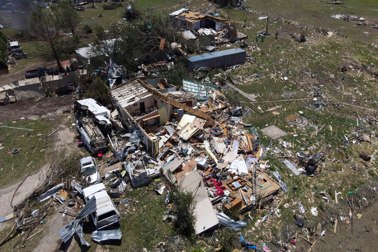 Homes are destroyed in Valley View, Texas, on Sunday, May 26, after a deadly tornado rolled through the night before. <a href="index.php?page=&url=https%3A%2F%2Fwww.cnn.com%2F2024%2F05%2F26%2Fweather%2Fmemorial-day-weekend-forecast-sunday%2Findex.html" target="_blank">At least 18 people were killed in four states</a> after suspected tornadoes struck the central United States.