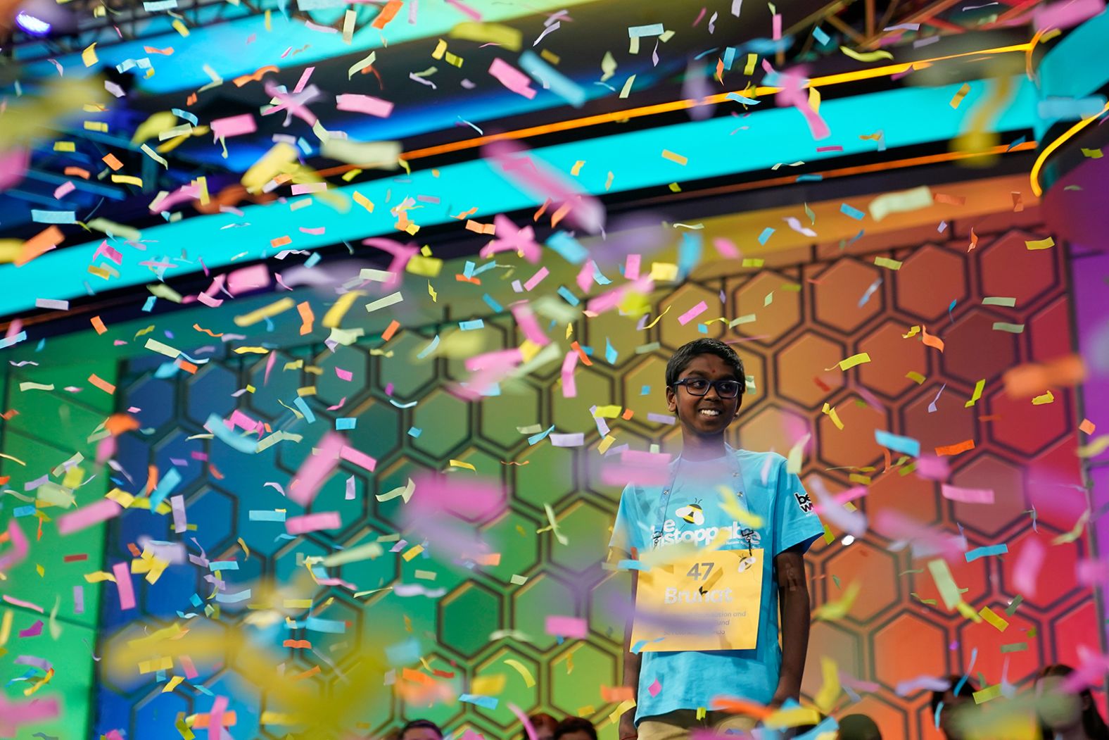 Bruhat Soma, 12, of Tampa, Florida, stands amid confetti after winning the Scripps National Spelling Bee, in National Harbor, Maryland, on May 30.