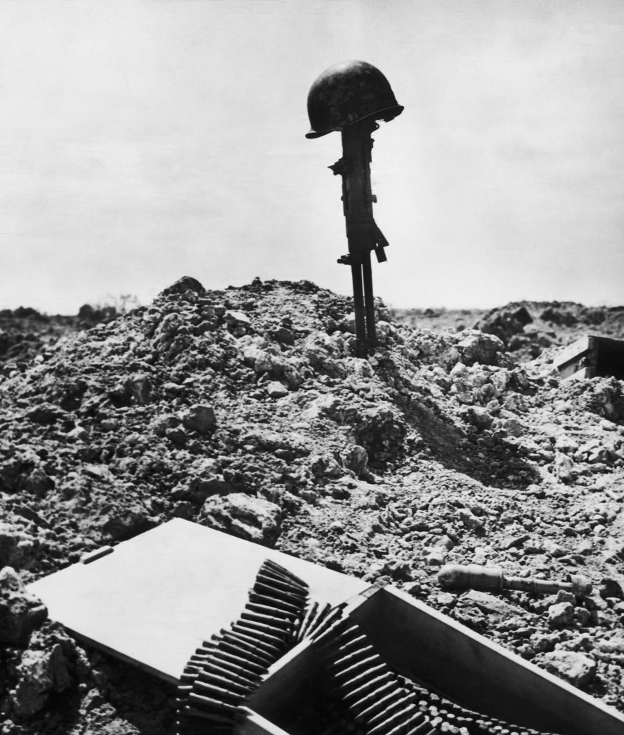 A makeshift monument pays tribute to a fallen American soldier at Normandy.