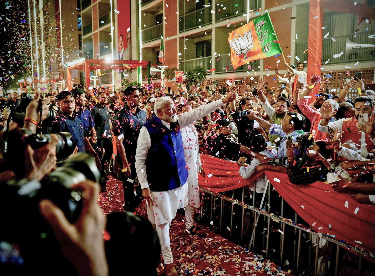Indian Prime Minister Narendra Modi is greeted by supporters as he arrives at his party's headquarters in New Delhi on Tuesday, June 4. Modi declared victory in national elections on Tuesday, but his goal of winning an unassailable majority was left in tatters after <a href="index.php?page=&url=https%3A%2F%2Fwww.cnn.com%2F2024%2F06%2F04%2Findia%2Findia-election-modi-victory-declaration-intl-hnk%2Findex.html" target="_blank">voters delivered a shock result</a> that reduced the extent of his party's grip on power.