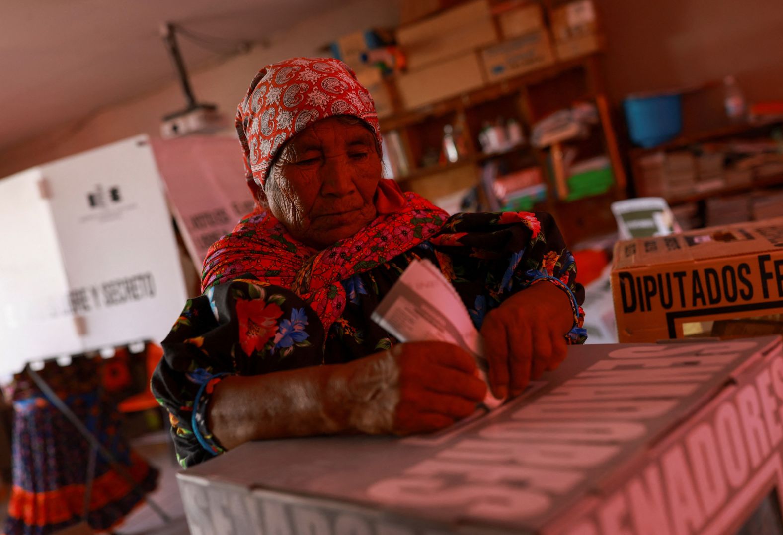 A Rarámuri woman casts her ballot at a polling station in Norogachi, Mexico, on Sunday, June 2. Mexico elected Claudia Sheinbaum, a physicist and former mayor of Mexico City, as <a href="index.php?page=&url=https%3A%2F%2Fwww.cnn.com%2F2024%2F06%2F03%2Famericas%2Fmexico-election-result-first-female-president-intl-hnk" target="_blank">its first female president</a>. Sheinbaum won around 60% of the vote, marking a historic achievement in a mostly Catholic country known for its deeply patriarchal culture.