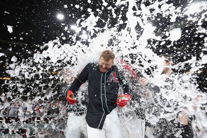 The Arizona Diamondbacks' Pavin Smith is dunked with water after he hit a home run to defeat the San Francisco Giants on Monday, June 3.