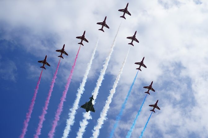 The Royal Air Force Aerobatic Team, aka the Red Arrows, flies over the British Normandy Memorial in Ver-sur-Mer, France, on Thursday.