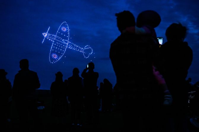 A D-Day themed drone display takes place above the Portsmouth Naval Memorial in Portsmouth, England, on Wednesday, June 5.