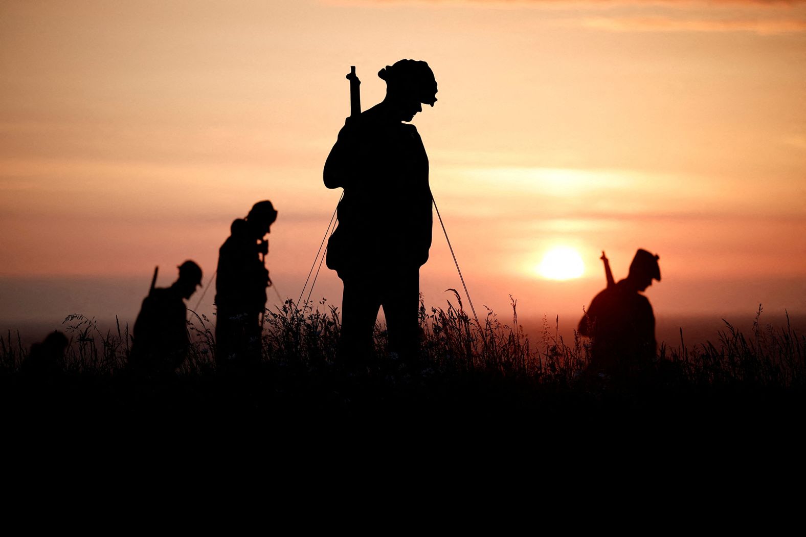 Silhouettes representing British soldiers who died during World War II are displayed at the British Memorial in Ver-sur-Mer on Saturday, June 1.