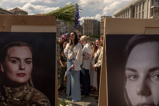 People in Kyiv, Ukraine, attend the funeral of Iryna "Cheka" Tsybukh, a Ukrainian combat medic who was killed in action, on Sunday, June 2.