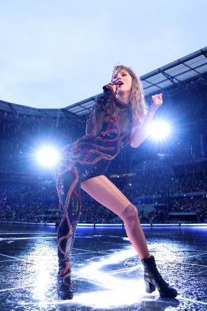 Swift performs in the rain in Lyon, France, in June 2024.