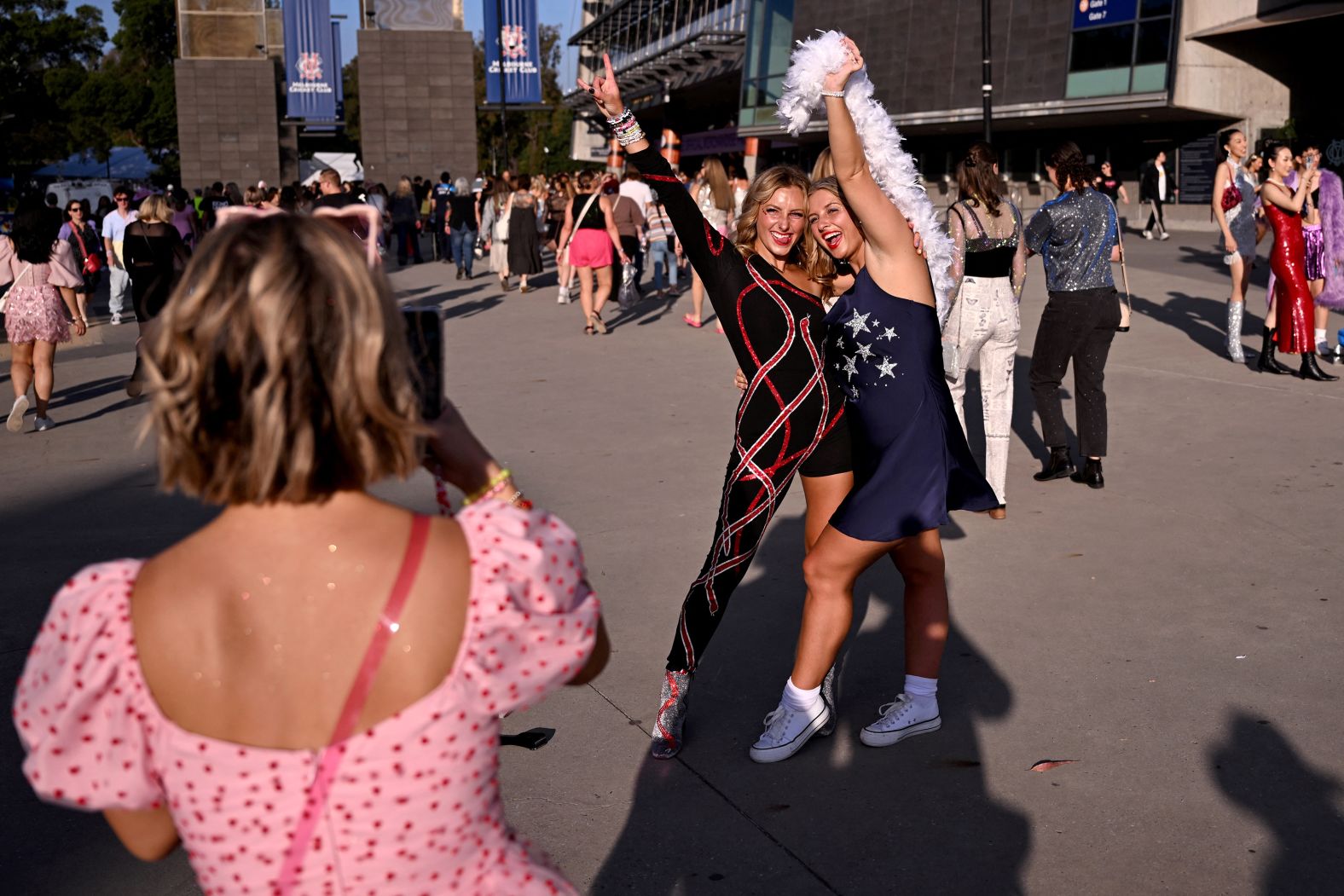 Fans pose for photos before a show in Melbourne in February 2024. 