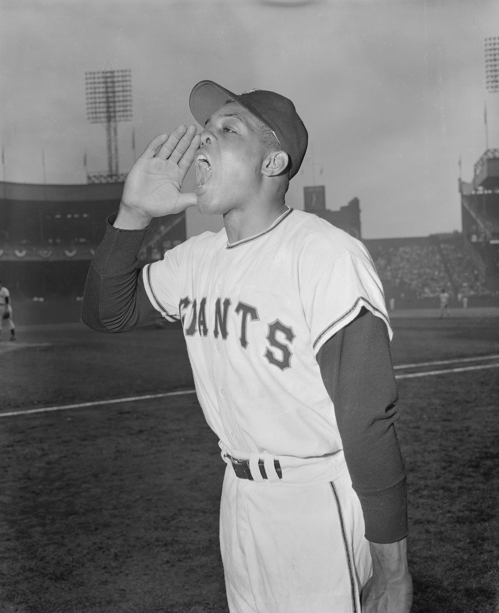 Mays yells 'Say hey!' before the second game of the 1954 World Series.