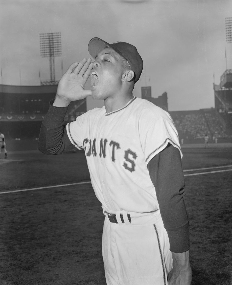 Mays yells "Say hey!" before the second game of the 1954 World Series. Mays was known as "The Say Hey Kid" for the way he enthusiastically greeted others. 