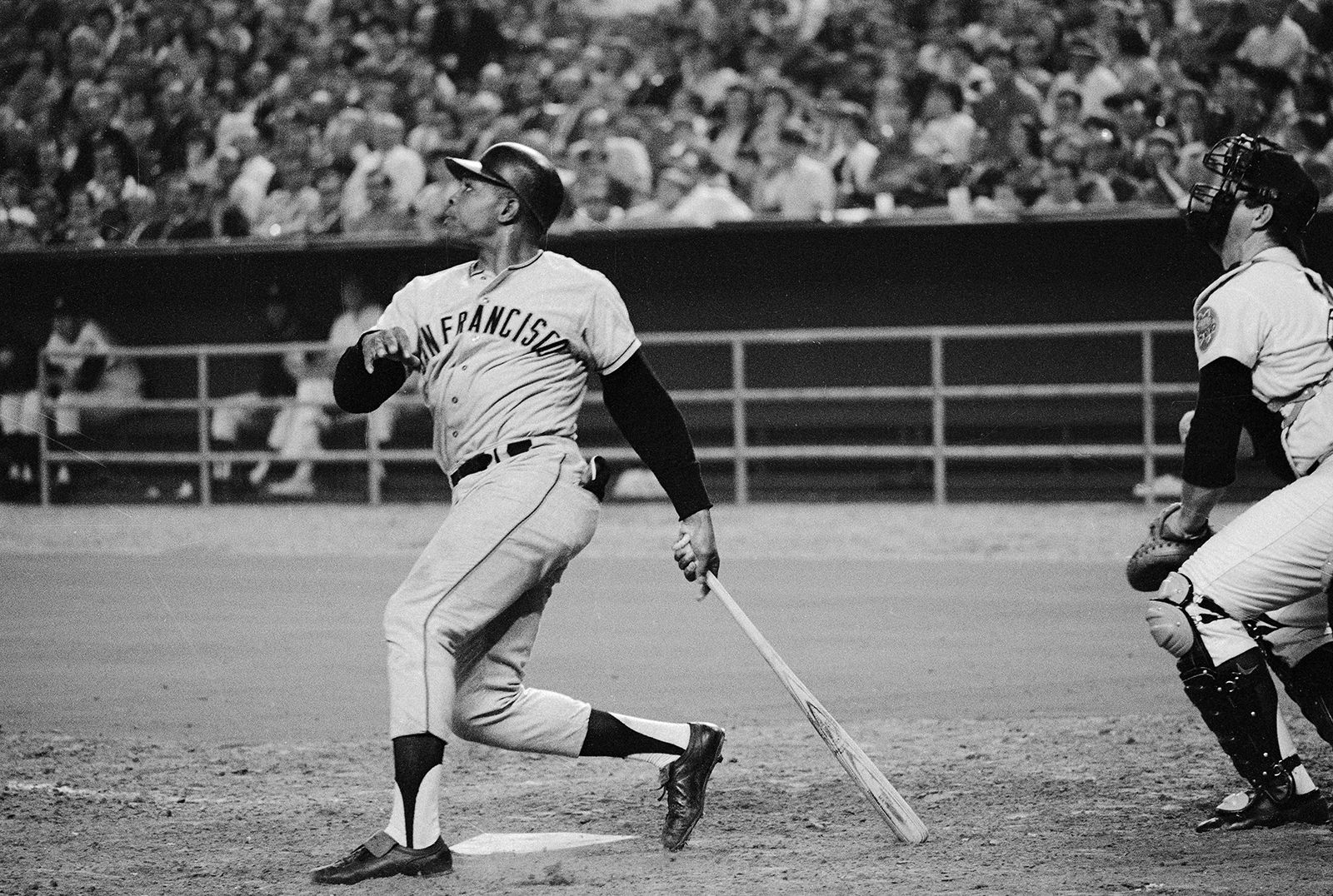 Mays watches the ball he hit go over the left field fence at the Astrodome in Houston, Texas.