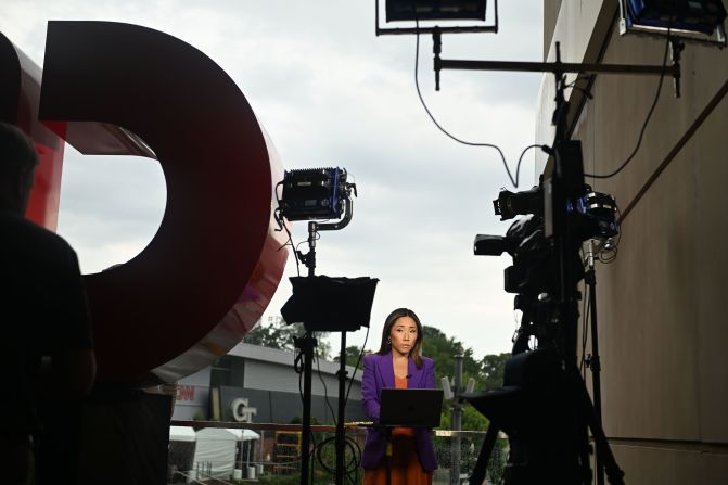 MJ Lee, senior White House correspondent for CNN, prepares for a live shot in Atlanta before the debate.