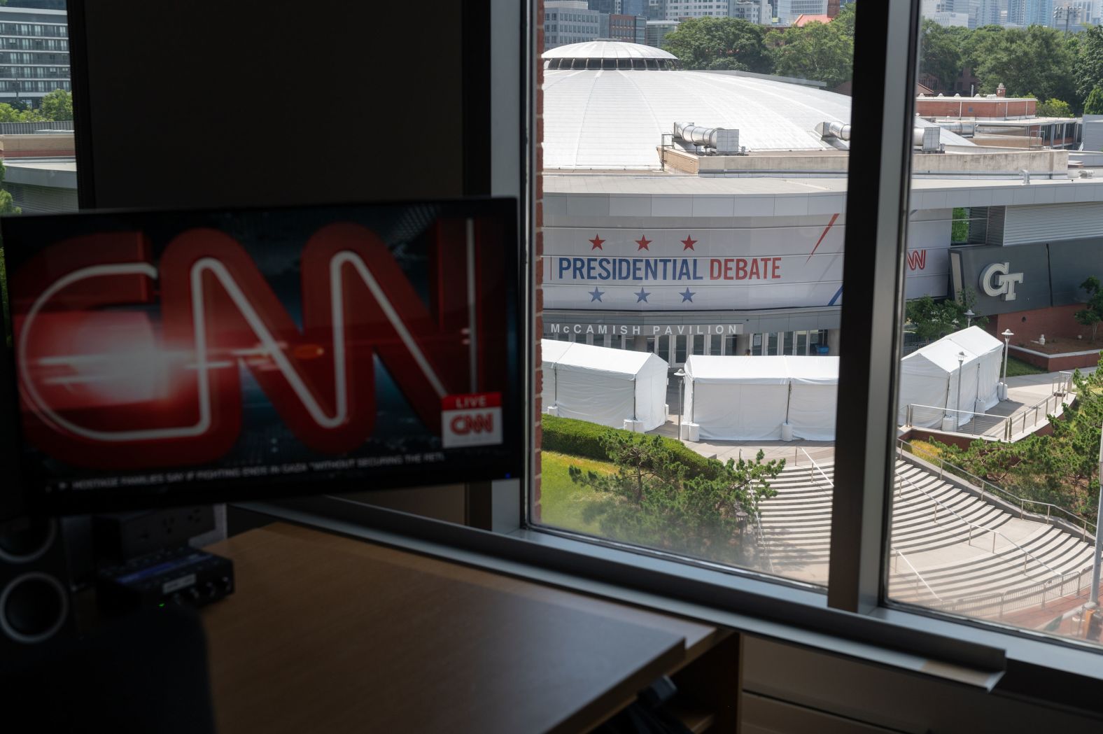 Debate banners hang from McCamish Pavilion across the street from the CNN campus in Atlanta.