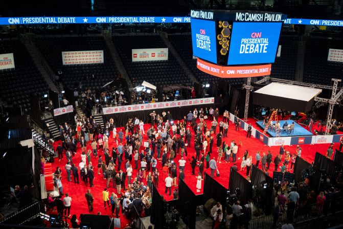 People gather on the floor of the post-debate "spin room," which was held at Georgia Tech's McCamish Pavilion across from CNN's headquarters.
