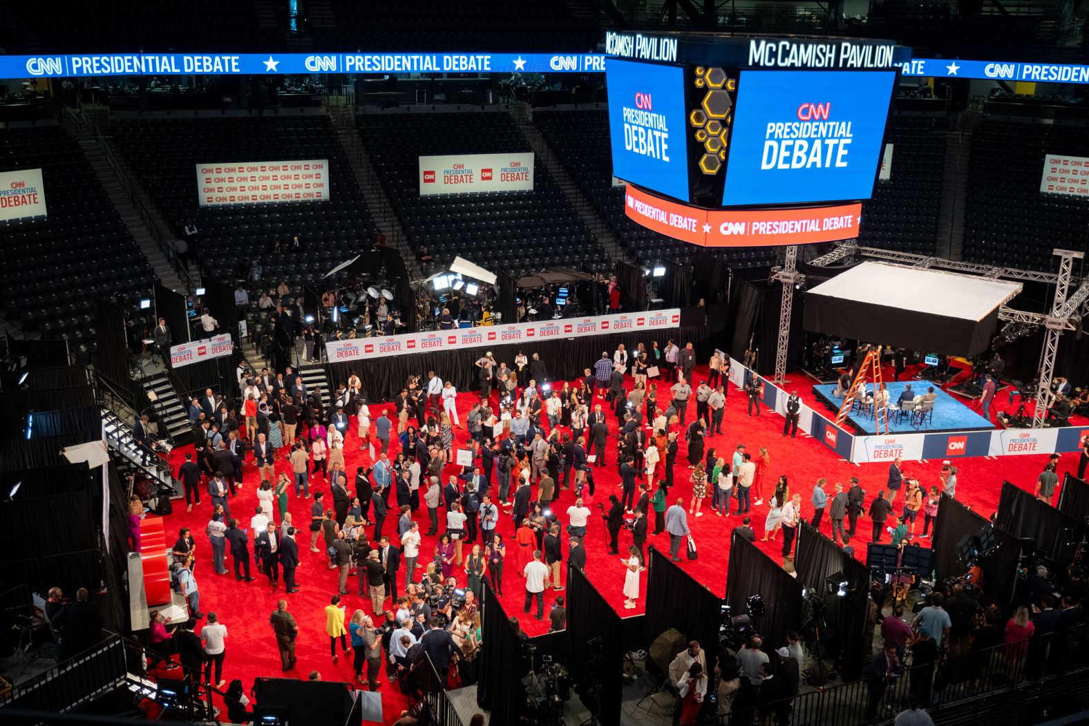 People gather on the floor of the post-debate "spin room," which was held at Georgia Tech's McCamish Pavilion across from CNN's headquarters.