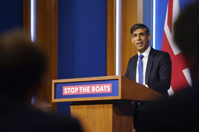 Sunak holds a news conference about immigration in December 2023. Sunak, himself the son of immigrants, has made bringing down the UK's net migration numbers one of his <a href="index.php?page=&url=https%3A%2F%2Fedition.cnn.com%2F2023%2F12%2F09%2Fuk%2Frishi-sunak-conservative-infighting-gbr-intl%2Findex.html" target="_blank">key priorities</a>, as small boat crossings in the English Channel have become a touchstone in British politics.