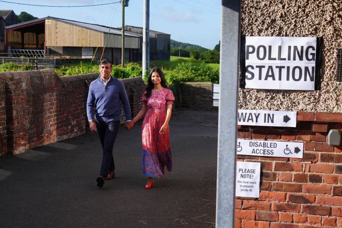 Sunak and his wife, Akshata Murty, arrive to cast their vote in the general election in July 2024.