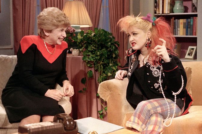 Sex therapist Dr. Ruth Westheimer talks with rock singer Cyndi Lauper in New York, Jan. 17, 1985. Westheimer, the sex therapist who became a pop icon, media star and best-selling author through her frank talk about once-taboo bedroom topics, died on Friday, July 12, 2024. She was 96.