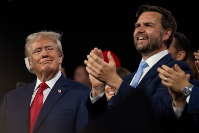 Trump looks at his running mate, Sen. JD Vance, during the <a  target="_blank">Republican National Convention</a> in July 2024, just two days after surviving the assassination attempt.