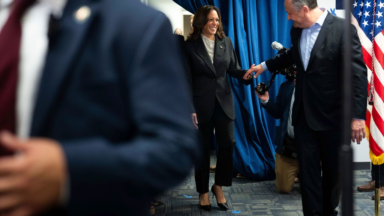 Vice President Kamala Harris, left, and second gentleman Doug Emhoff arrive to greet staff at her campaign headquarters in Wilmington, Del., Monday, July 22, 2024. (Erin Schaff/The New York Times via AP, Pool)