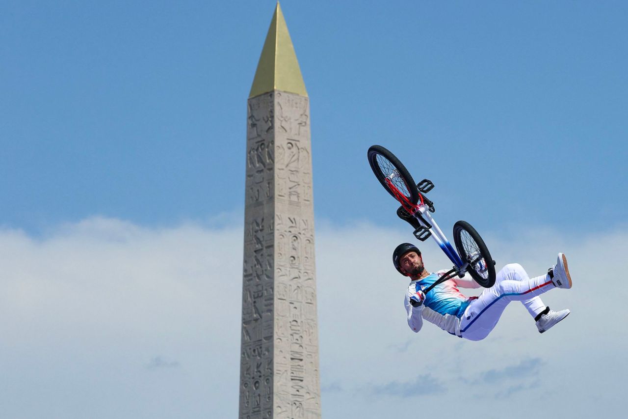 French cyclist Anthony Jeanjean competes in front of the Luxor Obelisk in Paris during the BMX freestyle final on July 31. He won the bronze. 