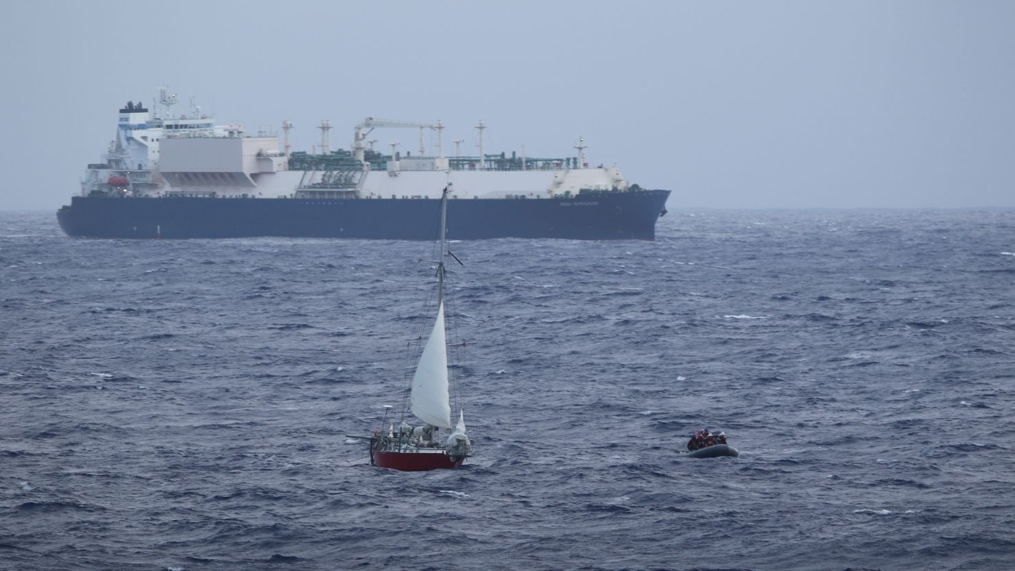 Crews with the Coast Guard and Navy rescued the woman, child and their pets who were stranded 925 miles off Honolulu.