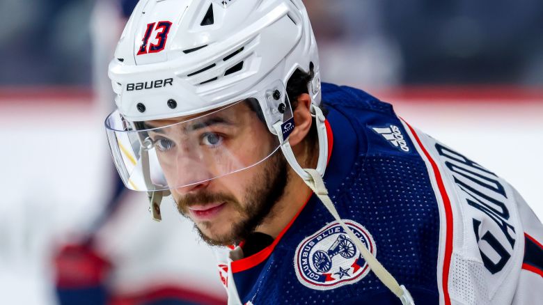 WINNIPEG, CANADA - JANUARY 09: Johnny Gaudreau #13 of the Columbus Blue Jackets looks on during the pre-game warm up prior to NHL action against the Winnipeg Jets at Canada Life Centre on January 09, 2024 in Winnipeg, Manitoba, Canada. (Photo by Jonathan Kozub/NHLI via Getty Images)