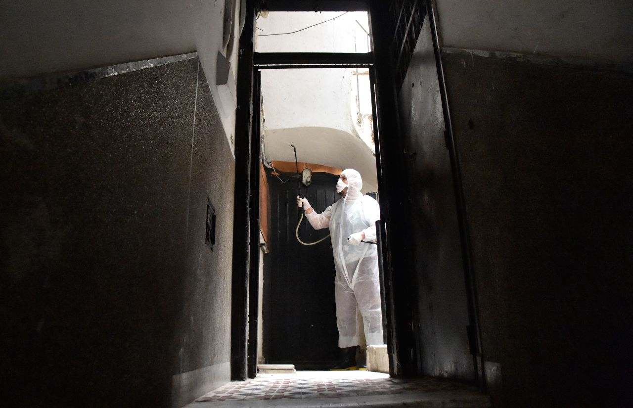 A worker disinfects a building in Algiers, Algeria on March 20.